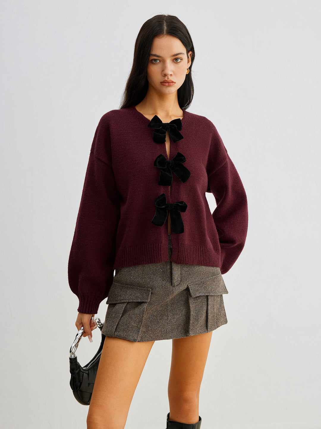 EB | Strickcardigan mit Samtschleifen Wollmischung Feminin und Modern