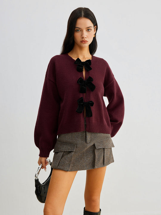 EB | Strickcardigan mit Samtschleifen Wollmischung Feminin und Modern