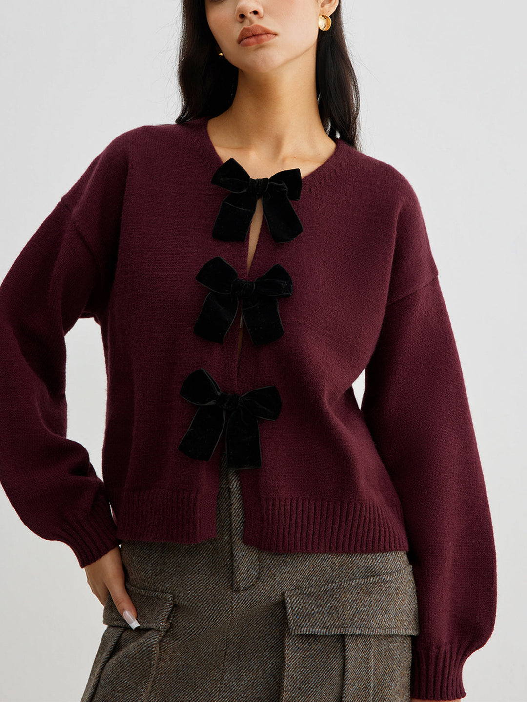 EB | Strickcardigan mit Samtschleifen Wollmischung Feminin und Modern