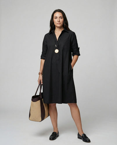 Kleid mit Eleganten langen Ärmeln.