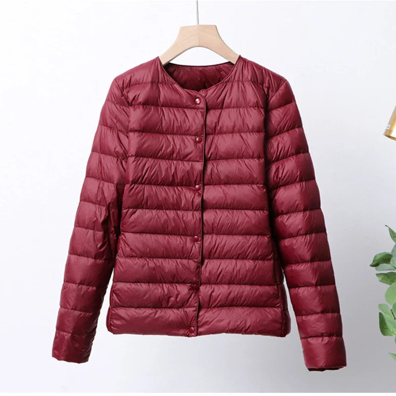 EB | Faltbare Pufferjacke mit Druckknopfverschluss