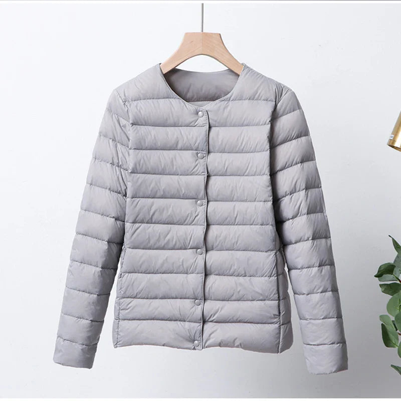 EB | Faltbare Pufferjacke mit Druckknopfverschluss