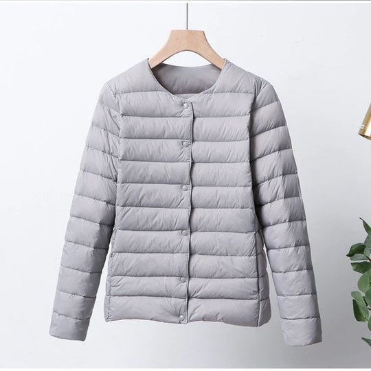 EB | Faltbare Pufferjacke mit Druckknopfverschluss