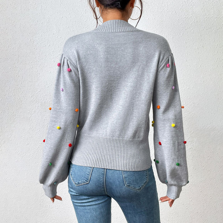 EB | Lässiger Strick-Pompons-Pullover