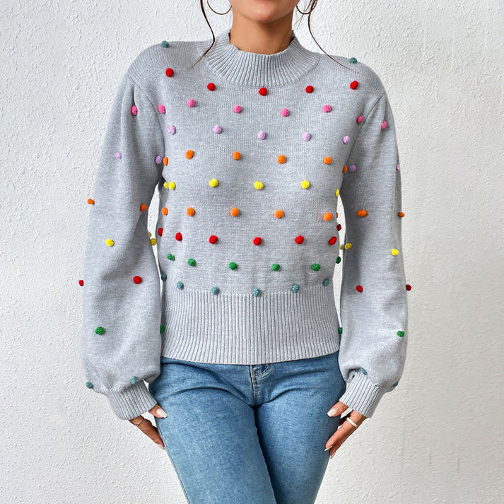 EB | Lässiger Strick-Pompons-Pullover