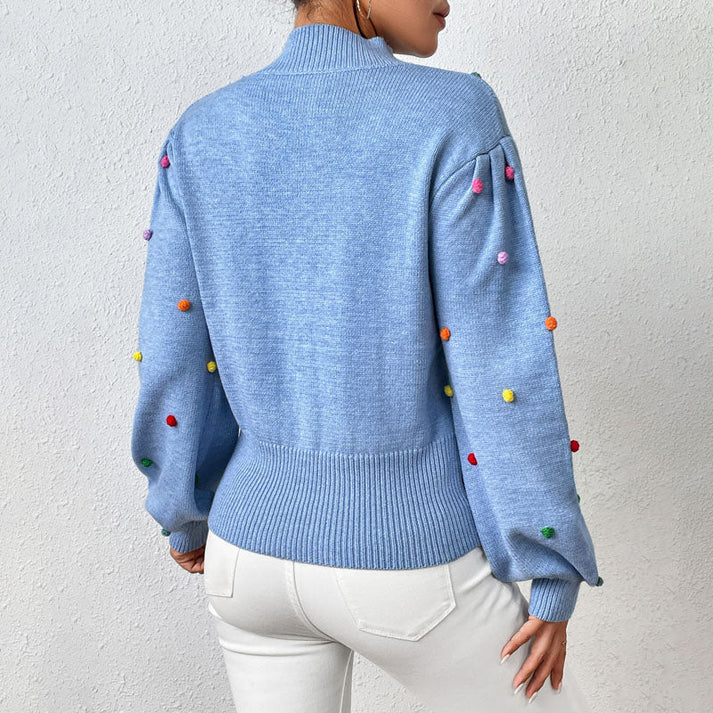 EB | Lässiger Strick-Pompons-Pullover