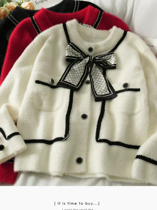 EB | Klassische und Stilvolle Strickjacke