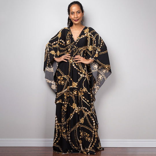 Damen Maxikleid mit kunstvollem Pfauenmuster und seitlichen Schlitzen Heidi Mode