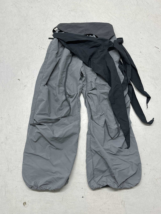 Damen modische High-Waist-Hose mit asymmetrischem Design und seitlichem Bindegurt EB