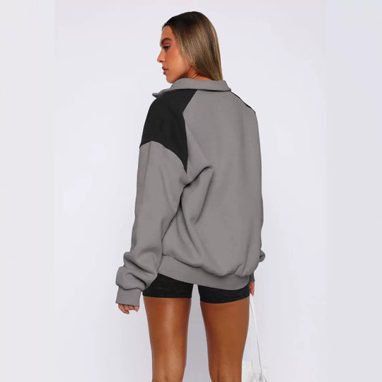 Damen lässiger Sweatshirt mit halbem Reißverschluss und kontrastierenden Ärmeln EB