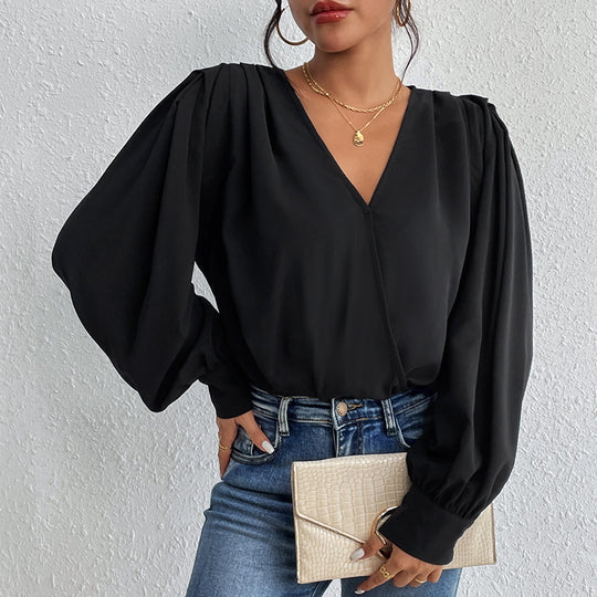Damen Wickelbluse mit V-Ausschnitt, gepufften Schultern und elastischem Saum EB