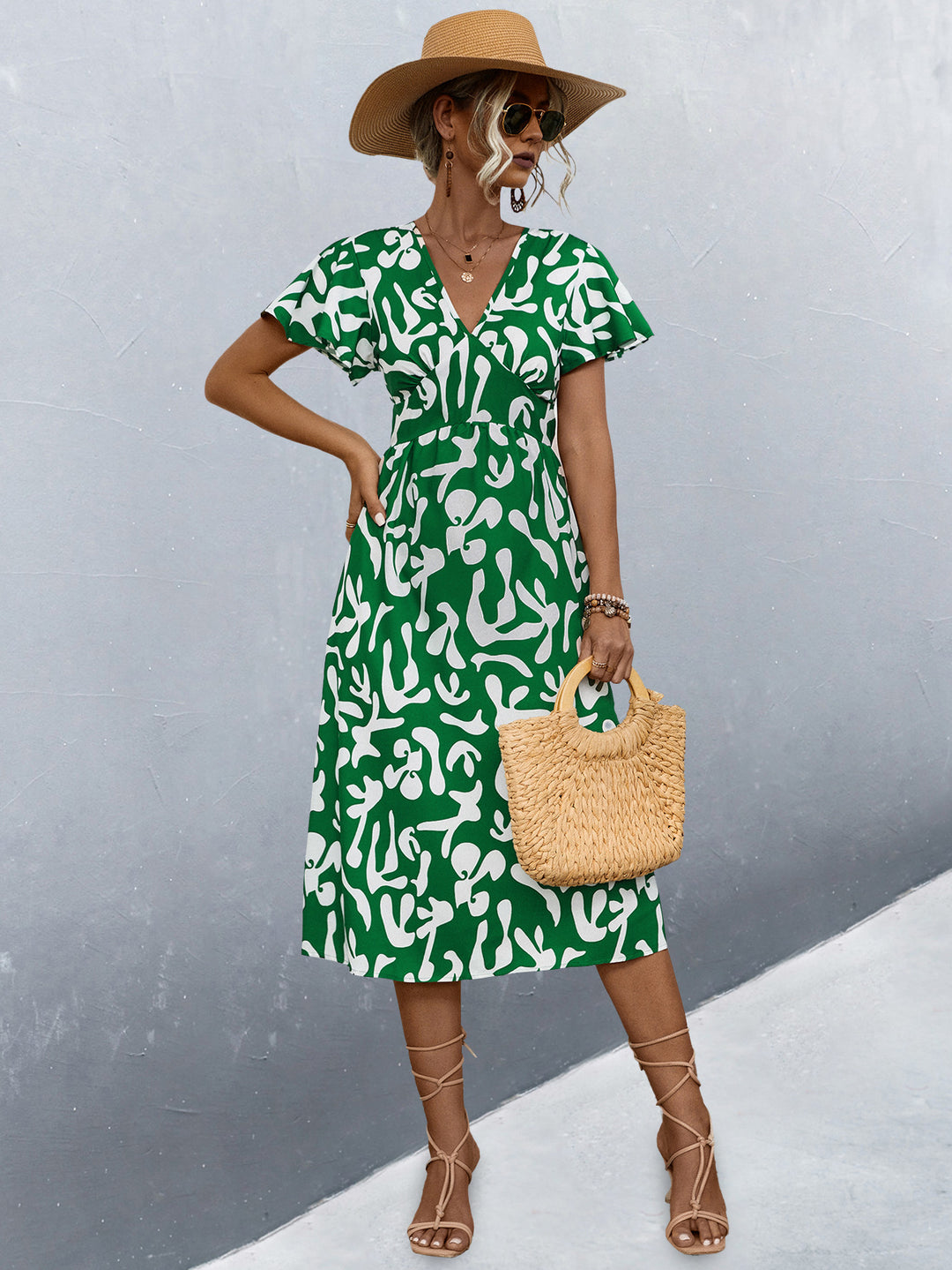 Damen Wickelkleid mit floralem Muster und eleganter Raffung EB