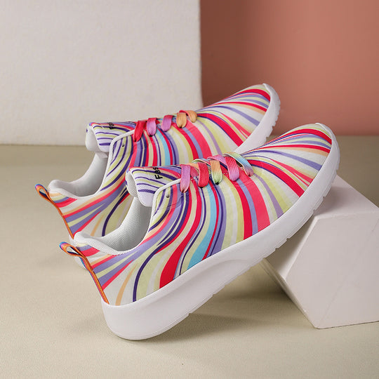 Damen Sportliche Sneakers mit buntem Wellenmuster EB