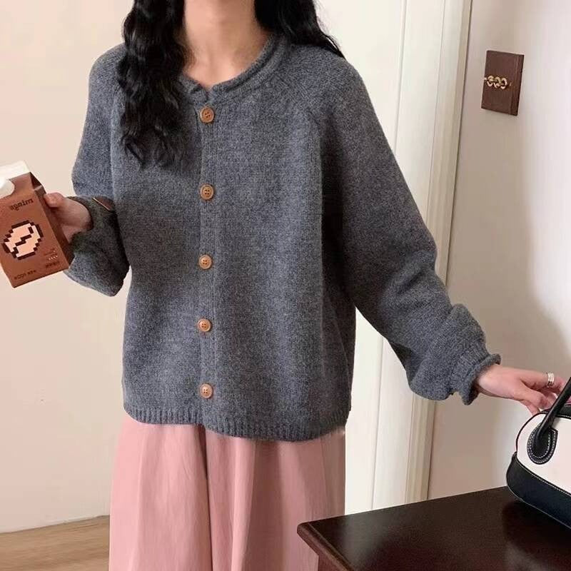 Damen Strickjacke mit asymmetrischem Schnitt und großzügigen Ballonärmeln EB
