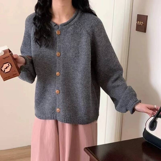 Damen Strickjacke mit asymmetrischem Schnitt und großzügigen Ballonärmeln EB