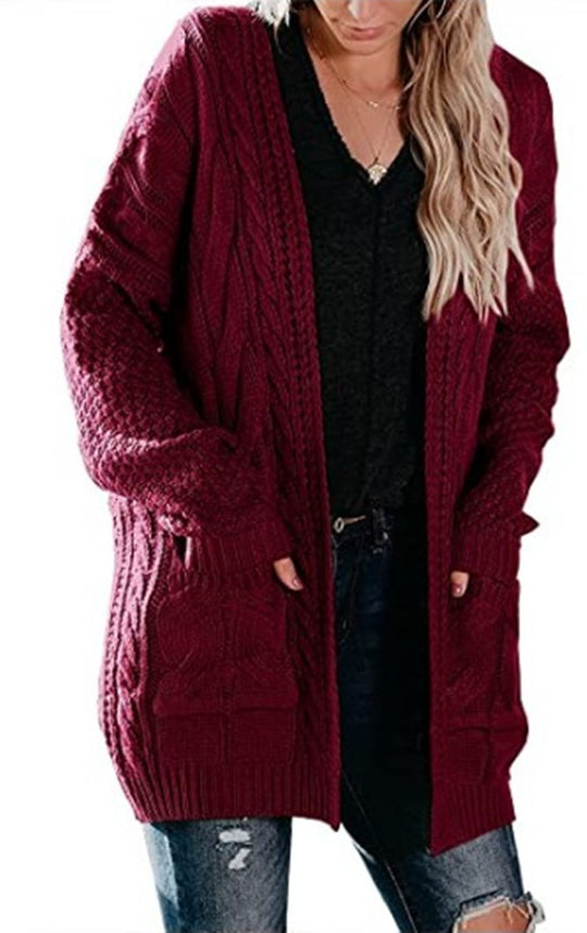 Damen Grobstrickjacke mit femininer Silhouette und praktischen Taschen EB