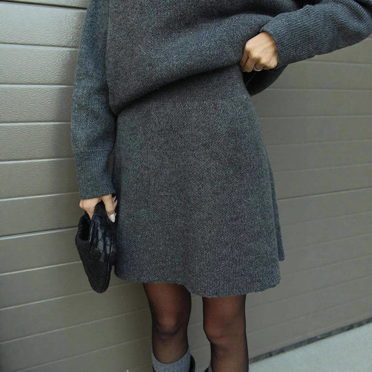 Damen bequemer Strickpullover mit überschnittenen Schultern und modischem Saum EB
