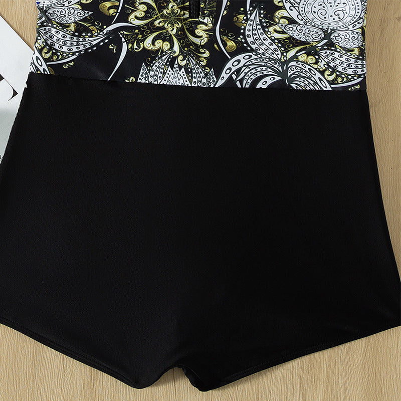 Damen Sporteinteiler mit floralem Design und kurzem Arm EB
