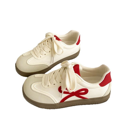 Damen Sneaker mit verspieltem Schleifen-Design und atmungsaktiven Einsätzen EB