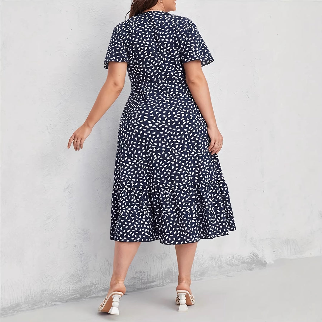 Damen Midi-Kleid mit fließendem Schnitt und verspieltem Muster EB