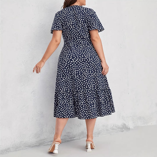 Damen Midi-Kleid mit fließendem Schnitt und verspieltem Muster EB