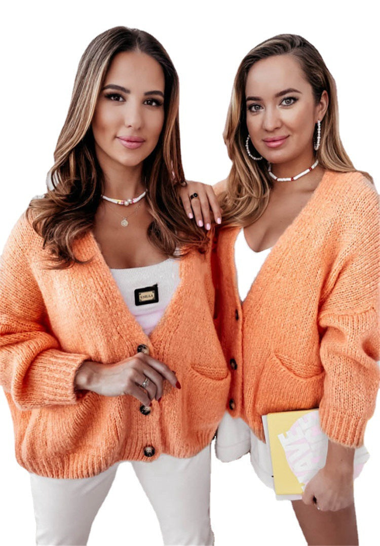 Damen Oversized Strickjacke mit Taschen und Knopfmuster EB