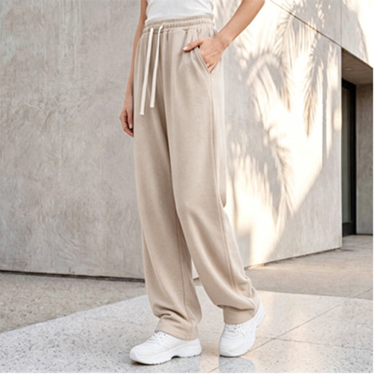 Damen nan weite Loungepalazzo-Hose mit hohem Komfortbund, Kordelzug, seitlichen Eingrifftaschen und dekorativer Seitennaht EB