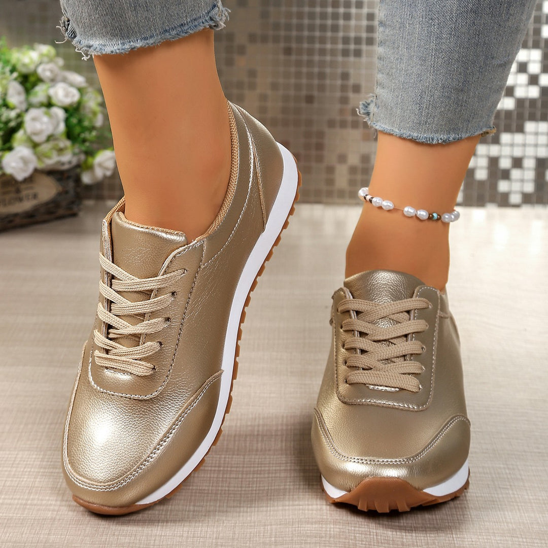 Damen modischer Metallic-Sneaker mit dämpfender Leichtsohle und rutschfester Profilgummisohle EB