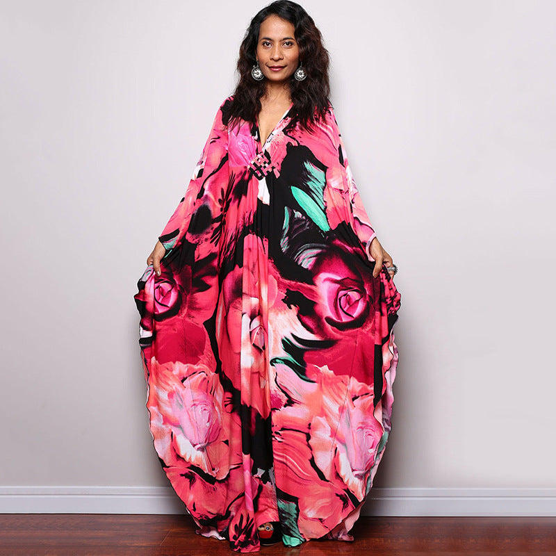 Damen Maxikleid mit kunstvollem Pfauenmuster und seitlichen Schlitzen Heidi Mode