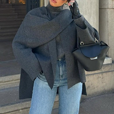Damen Oversized Strickjacke mit elegantem Schnitt und voluminösen Ärmeln EB
