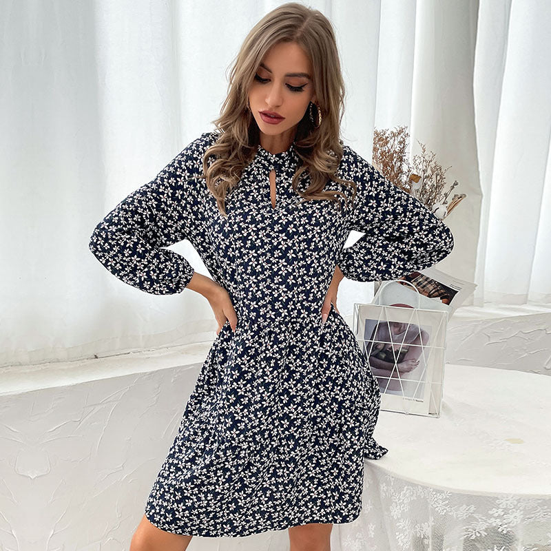 Damen Blümchen-Midikleid mit schickem Standkragen und asymmetrischem Schnitt EB