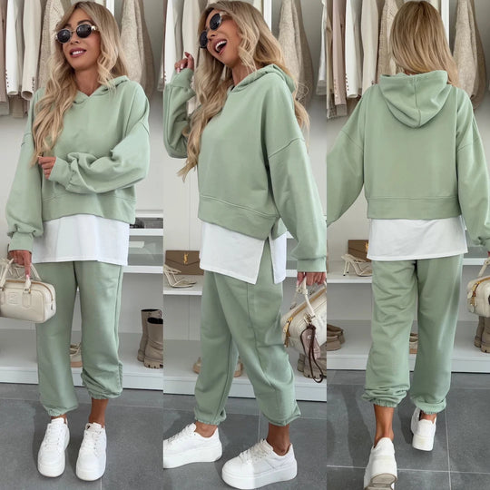 Damen Cropped-Hoodie-Lounge-Set mit asymmetrischem Saum, voluminösen Raglanärmeln und gekrempelter Jogginghose Eichborn Berlin