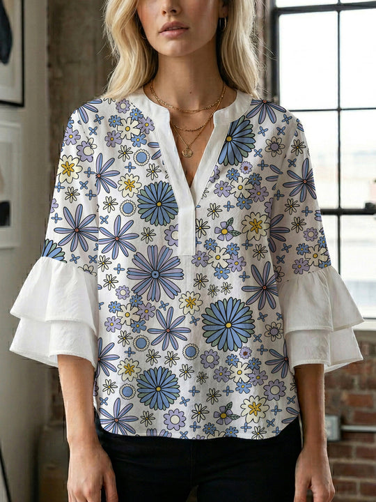 Damen Bluse mit voluminösen Ärmeln und floralem Design EB