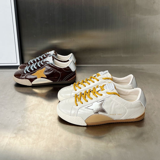 Damen Sneakers im sportlich-eleganten Design mit auffälligem Sternmotiv EB