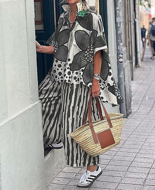Damen Übergroßes Tunika-Set mit floralem Muster und gestreiften Hosen EB