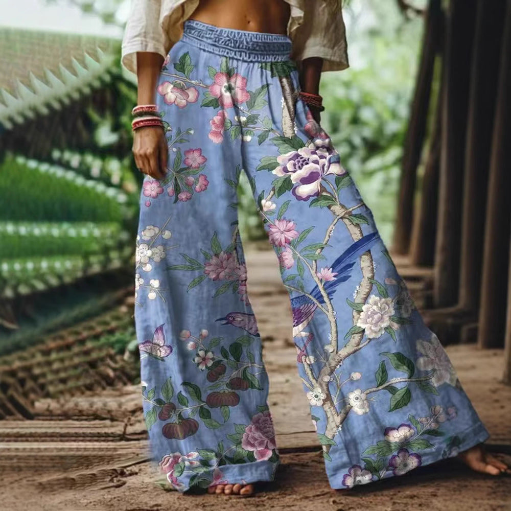 Damen Weite Sommerhose mit buntem Blumen- und Schmetterlingsprint EB