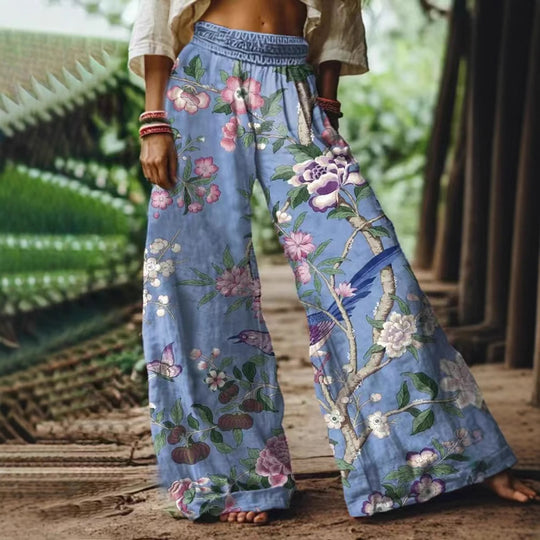 Damen Weite Sommerhose mit buntem Blumen- und Schmetterlingsprint EB