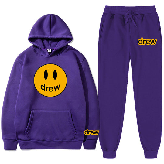 Unisex nan zweiteiliges Lounge-Set aus French-Terry mit Smiley-Print Kapuzenpullover und tapered Jogginghose EB