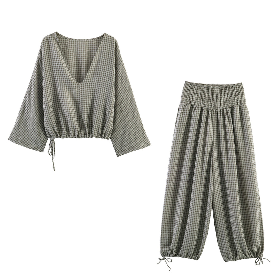 Damen lässige Bluse mit weitem V-Ausschnitt und elastischem Saum EB