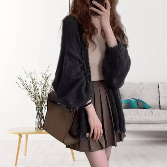 Damen gemütliche Strickjacke mit voluminösen Ärmeln EB