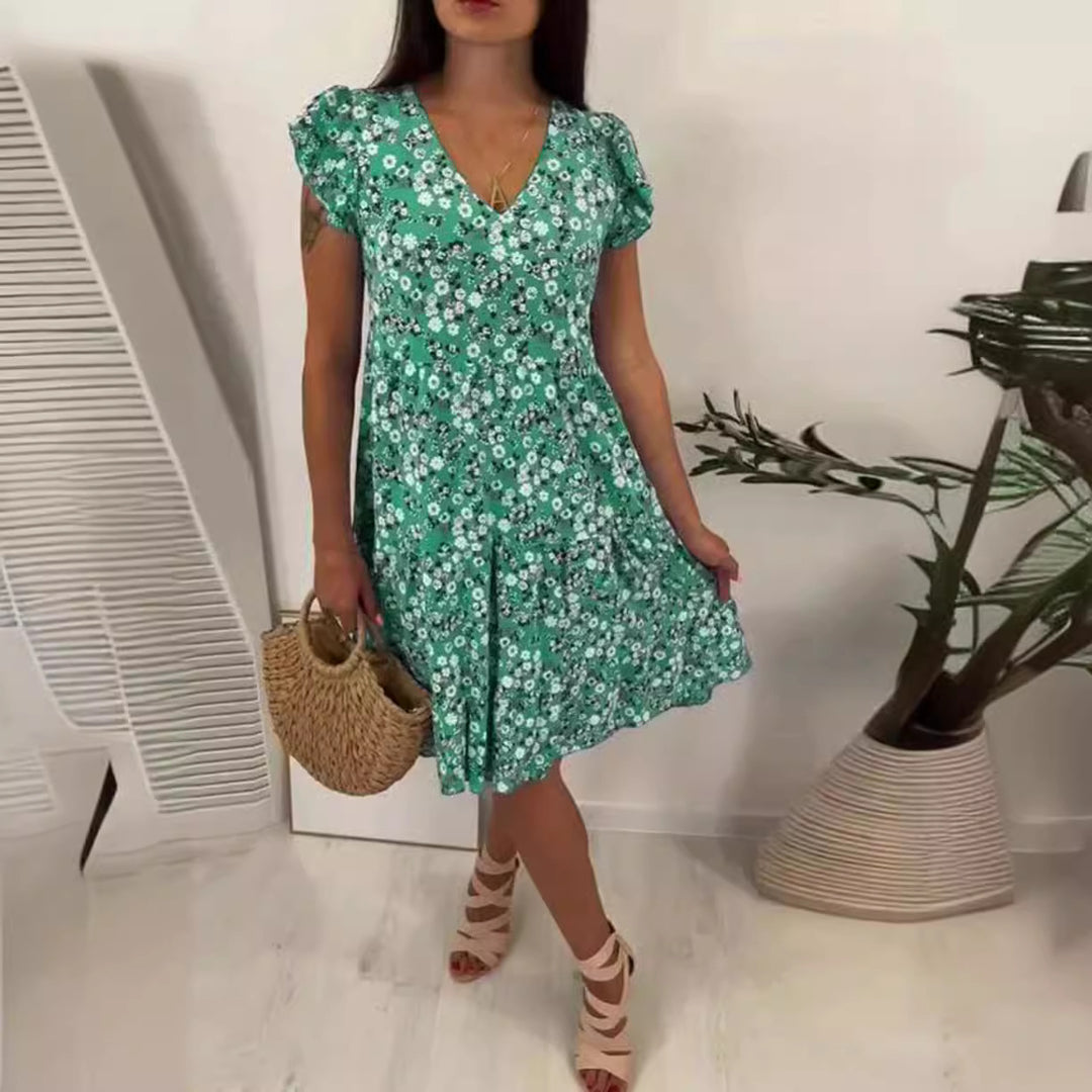 Damen Freizeitkleid mit fließendem Schnitt und floralen Akzenten Heidi-Mode
