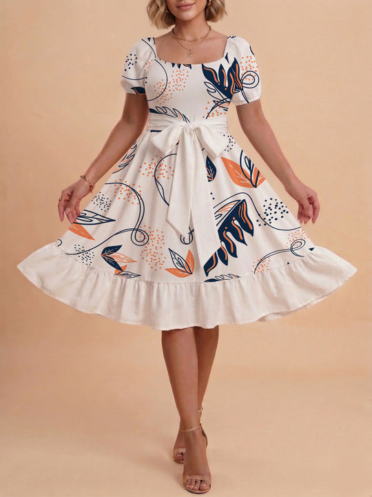 Damen Sommerliches Blumenkleid mit taillierbarem Gürtel und voluminösen Ärmeln EB