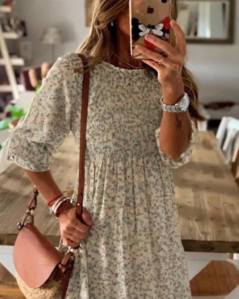 Damen Kleid mit floralen Akzenten und luftigen Puffärmeln Heidi-Mode