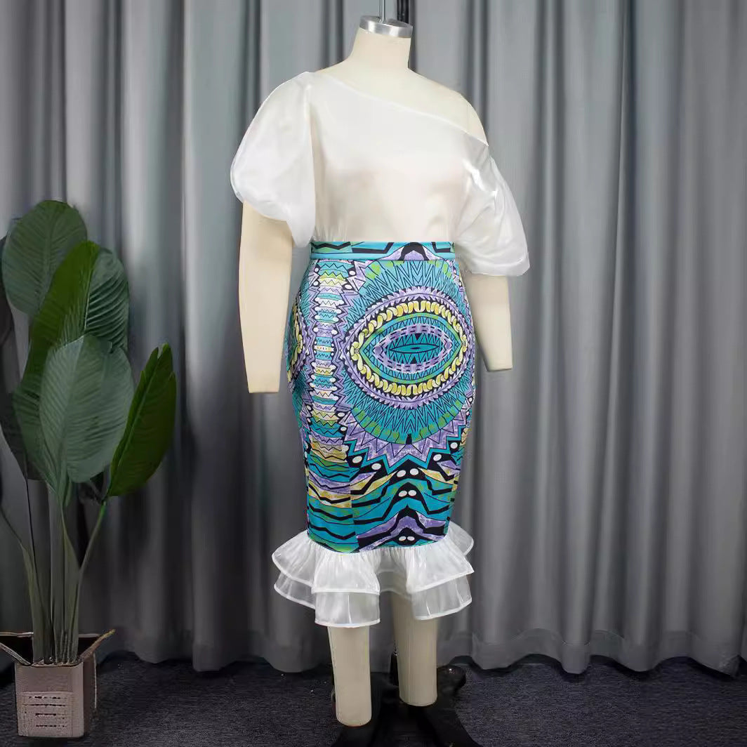 Damen Elegantes Kleid mit asymmetrischem Design und buntem Print EB