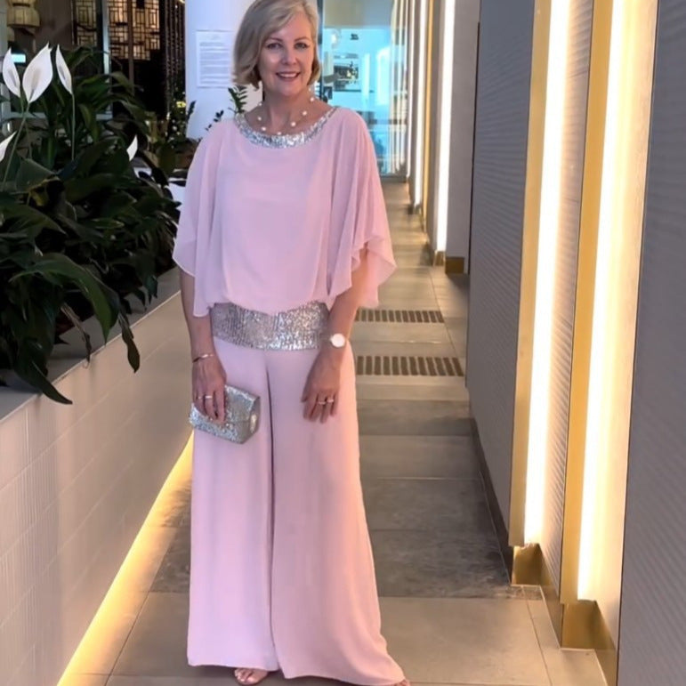 Damen eleganter Jumpsuit mit fließendem Stoff und schickem Taillengürtel EB