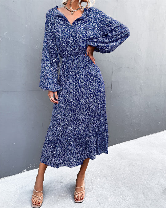 Damen Midikleid mit verspielt-floralem Design und weiten Ärmeln EB