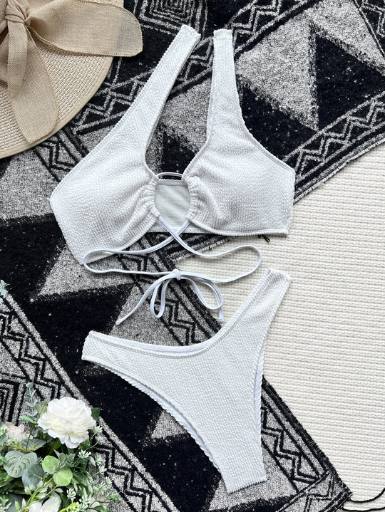 Damen Trendiger Monokini mit asymmetrischem Schnitt und raffiniertem Ringdetail EB