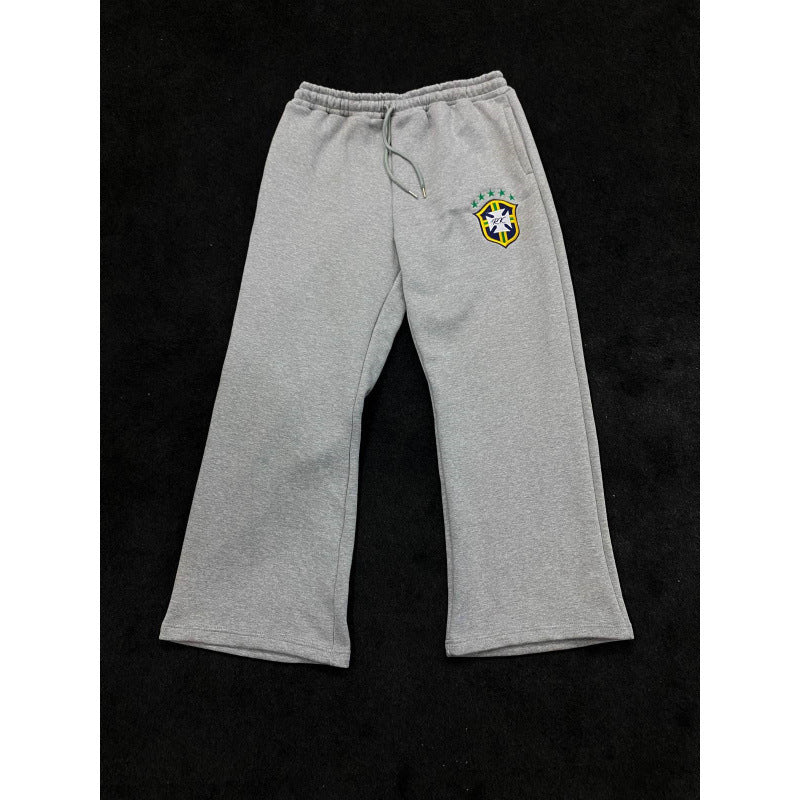 Damen nan weite Jogginghose mit elastischem Bund, Tunnelzug und gesticktem Emblem EB