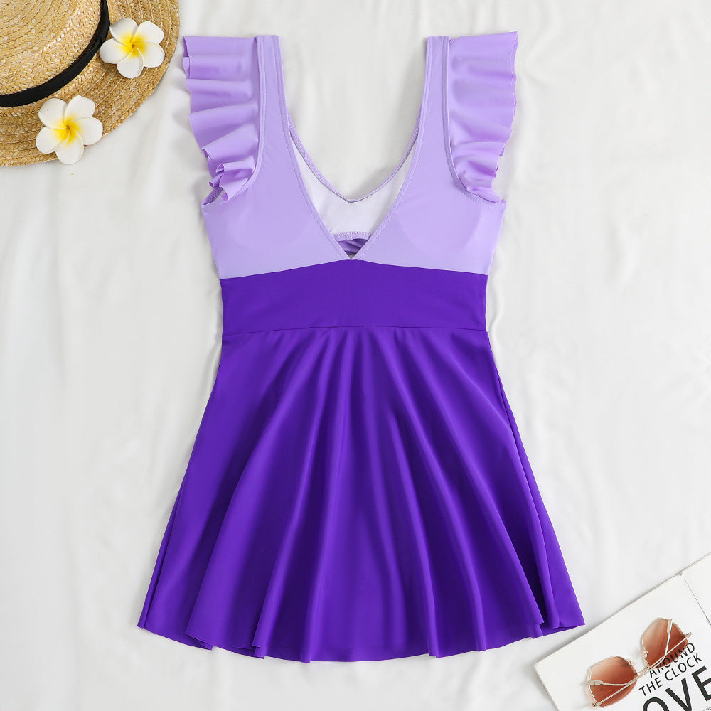 Damen Einteiler-Badeanzug mit femininem Wickeldesign und Cut-Out-Details EB