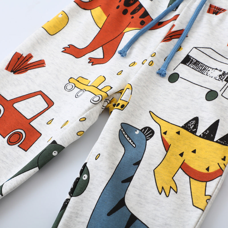 Jungen Jogginghose mit buntem Dinosaurier- und Fahrzeug-Design EB